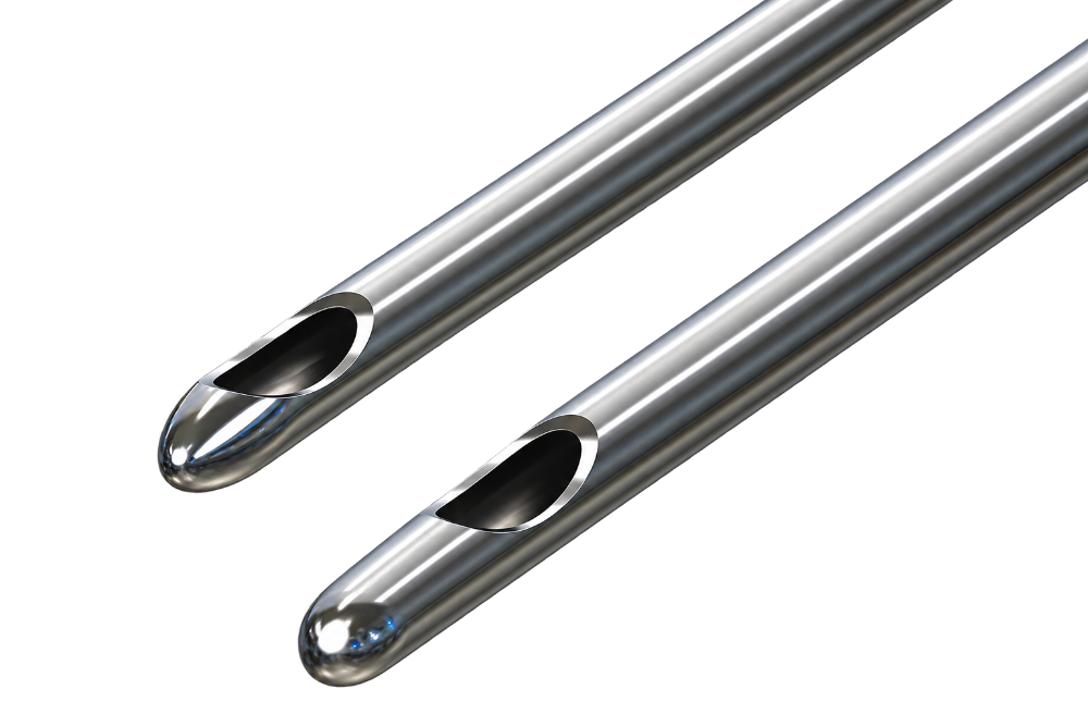 Close view of two STERiJECT needle tips showing bevel geometry