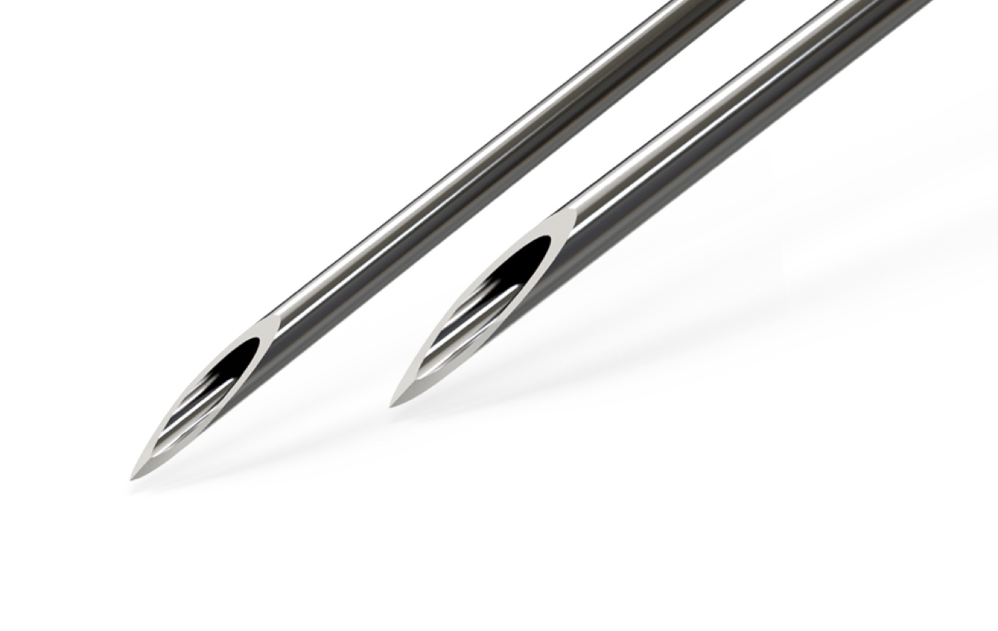 Close view of two STERiJECT needle tips showing bevel geometry