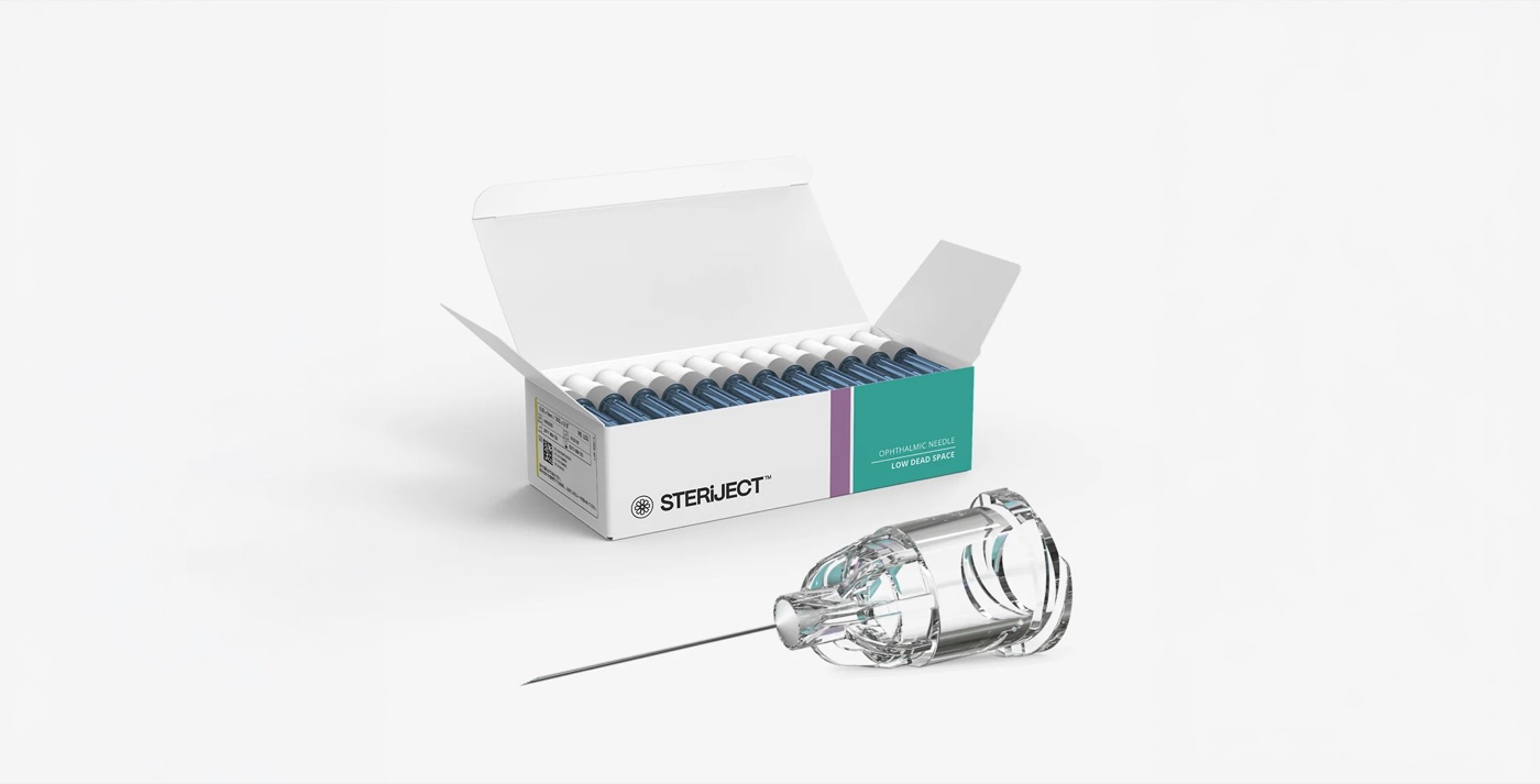 An open box of STERiJECT Ophthalmic Low Dead Space needles with a single needle alongside